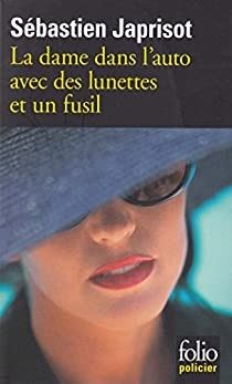 La dame dans l'auto avec des lunettes et un fusil - Click to enlarge picture.